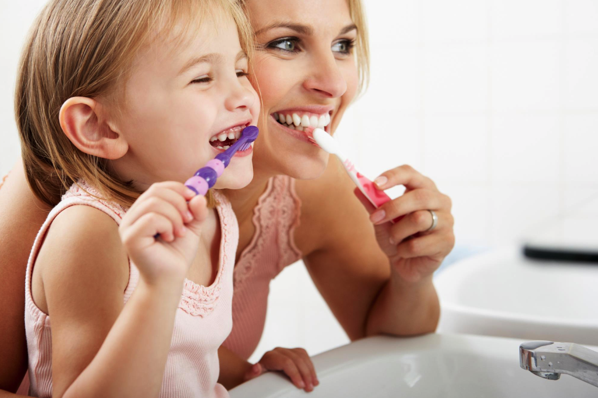 415-kids-brushing-their-teeth.png