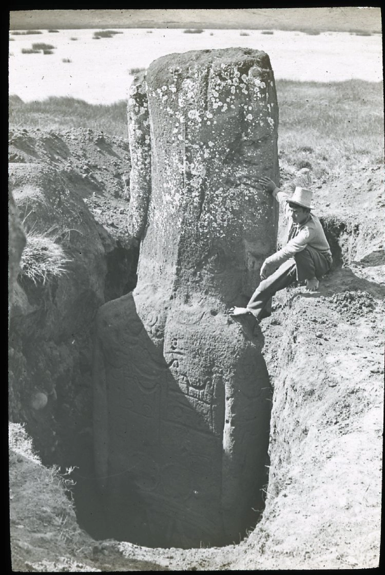3424-viewofthebackofamoaiwithpetroglyphcarvingspartiallyexcavatedasout-17491846441685.jpg
