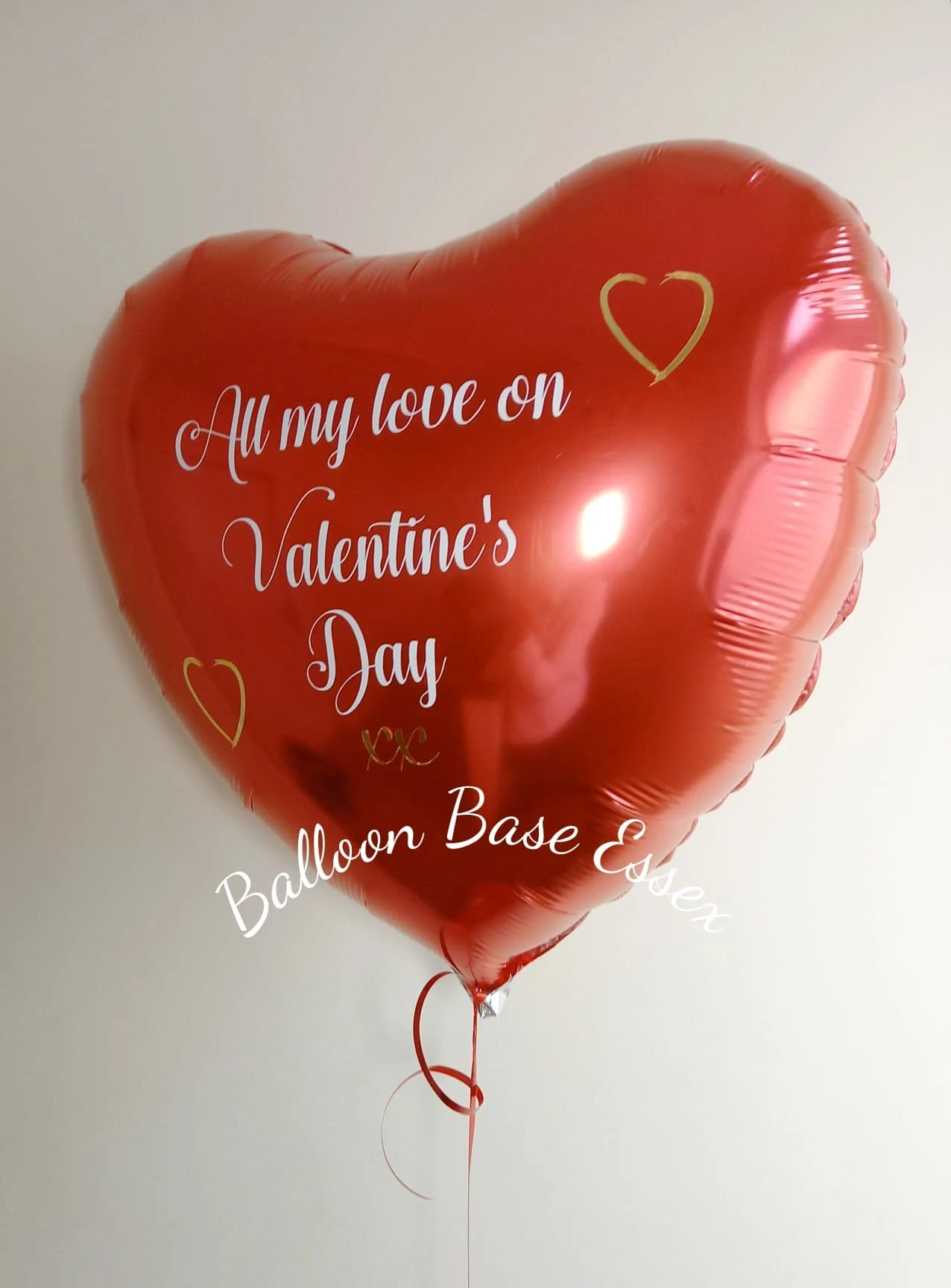 Red heart balloon with personalised Valentine's Day message