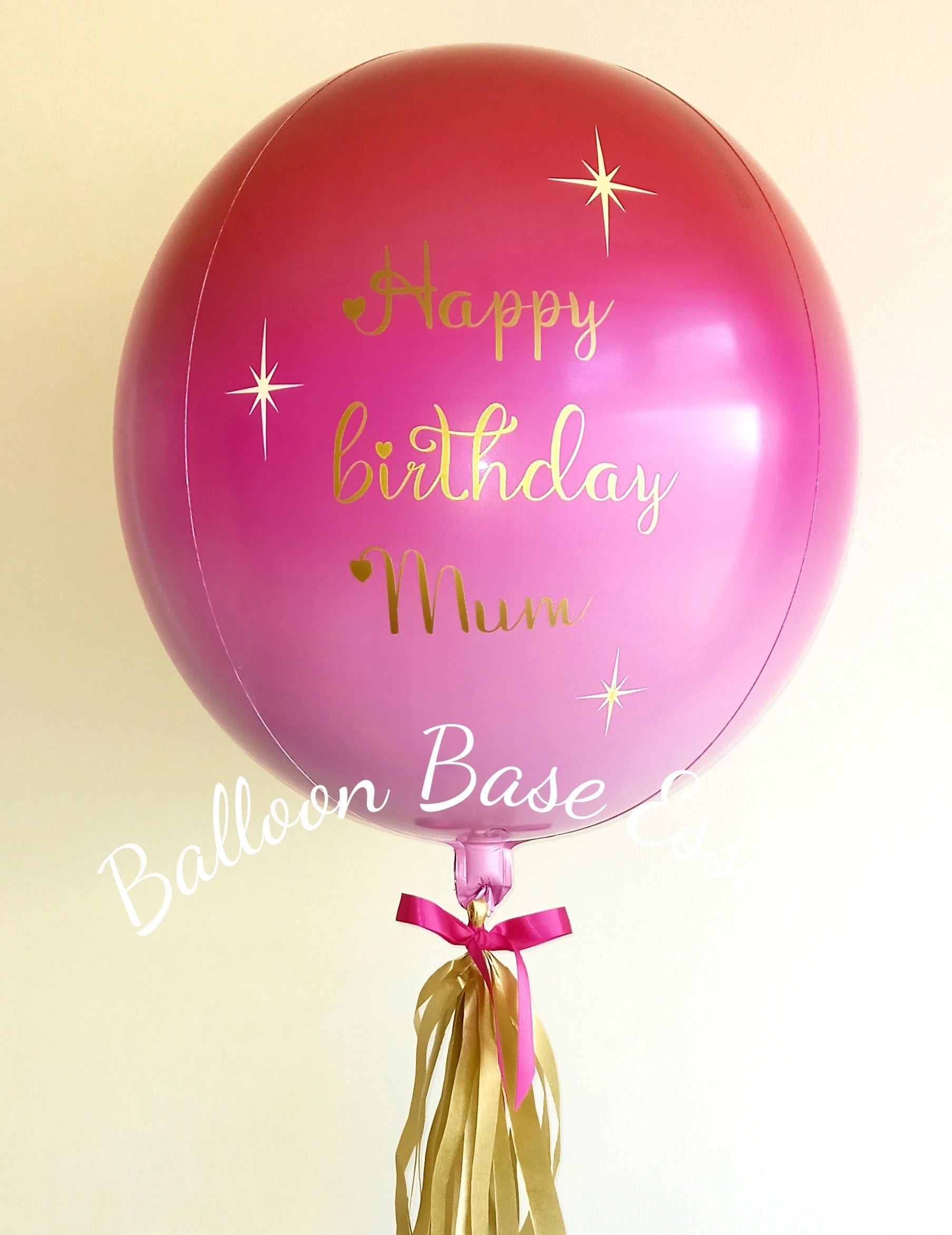 Red pink ombre balloon with personalised message and gold tassel