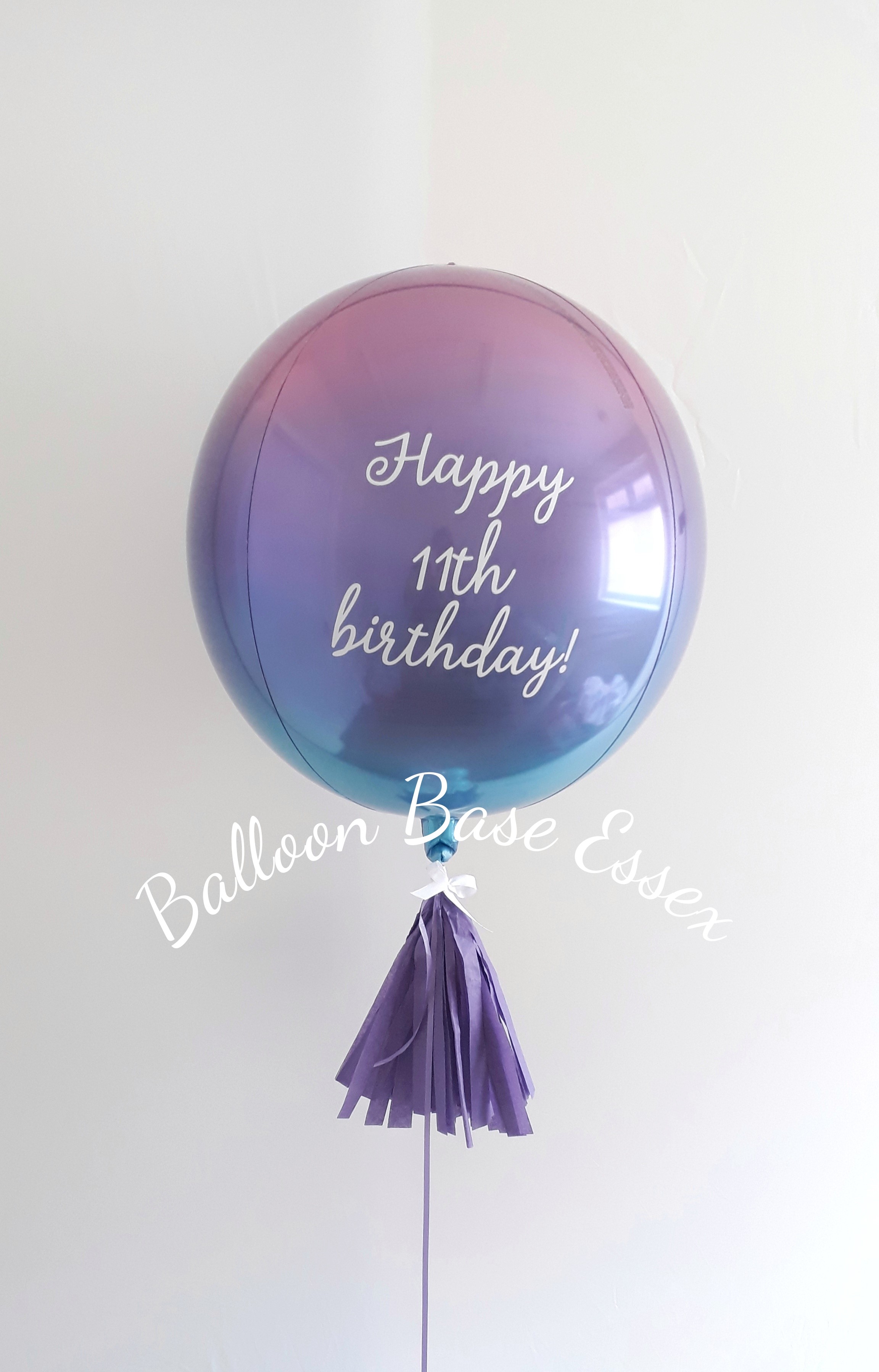 Pink purple and blue ombre balloon with tassel