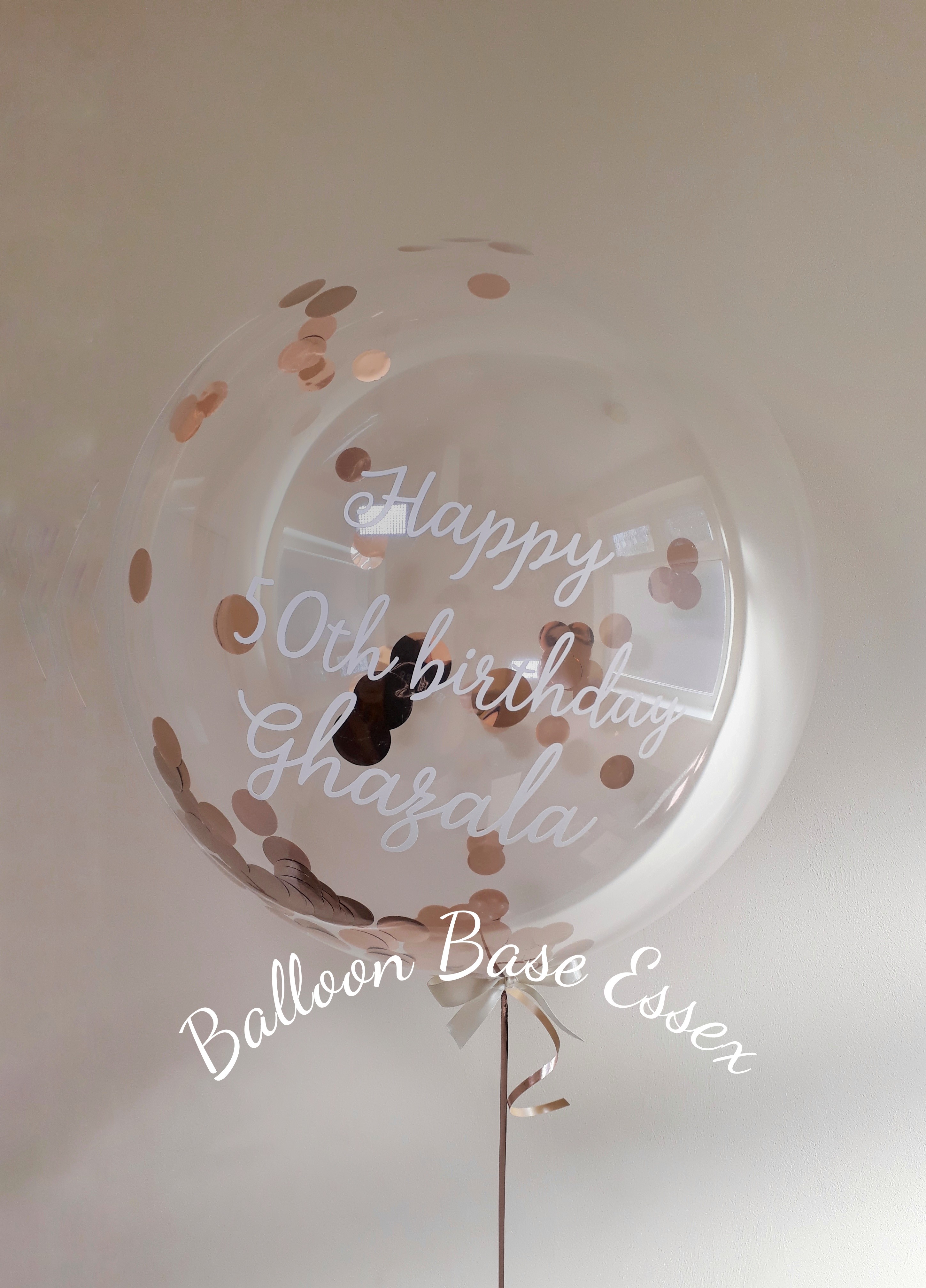 Confetti bubble balloon with white writing