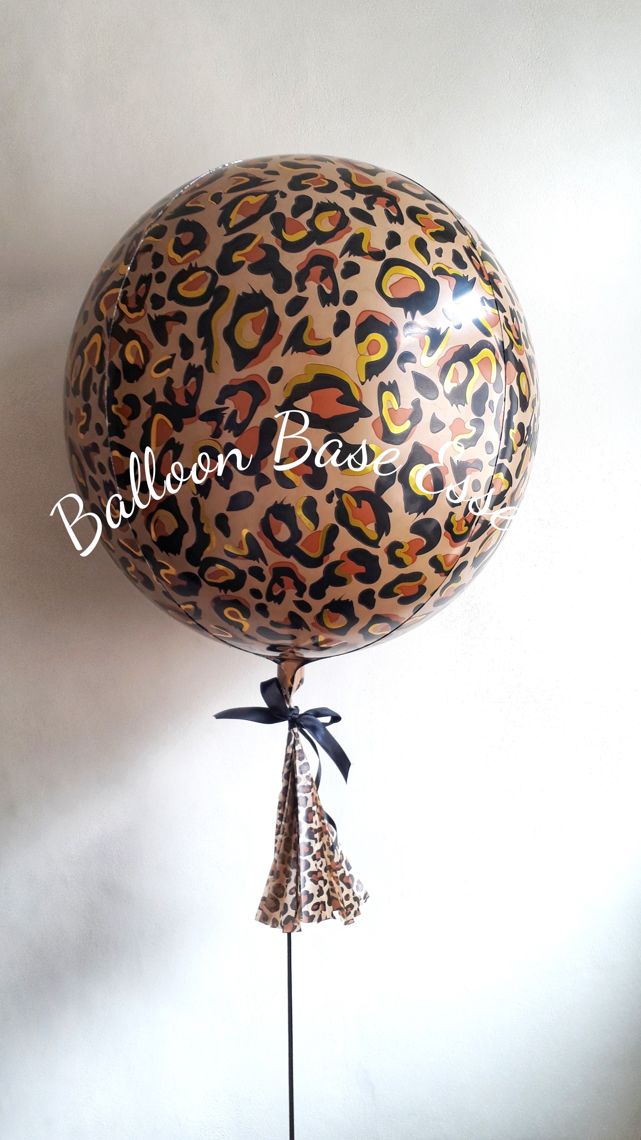 Leopard print balloon with tassel