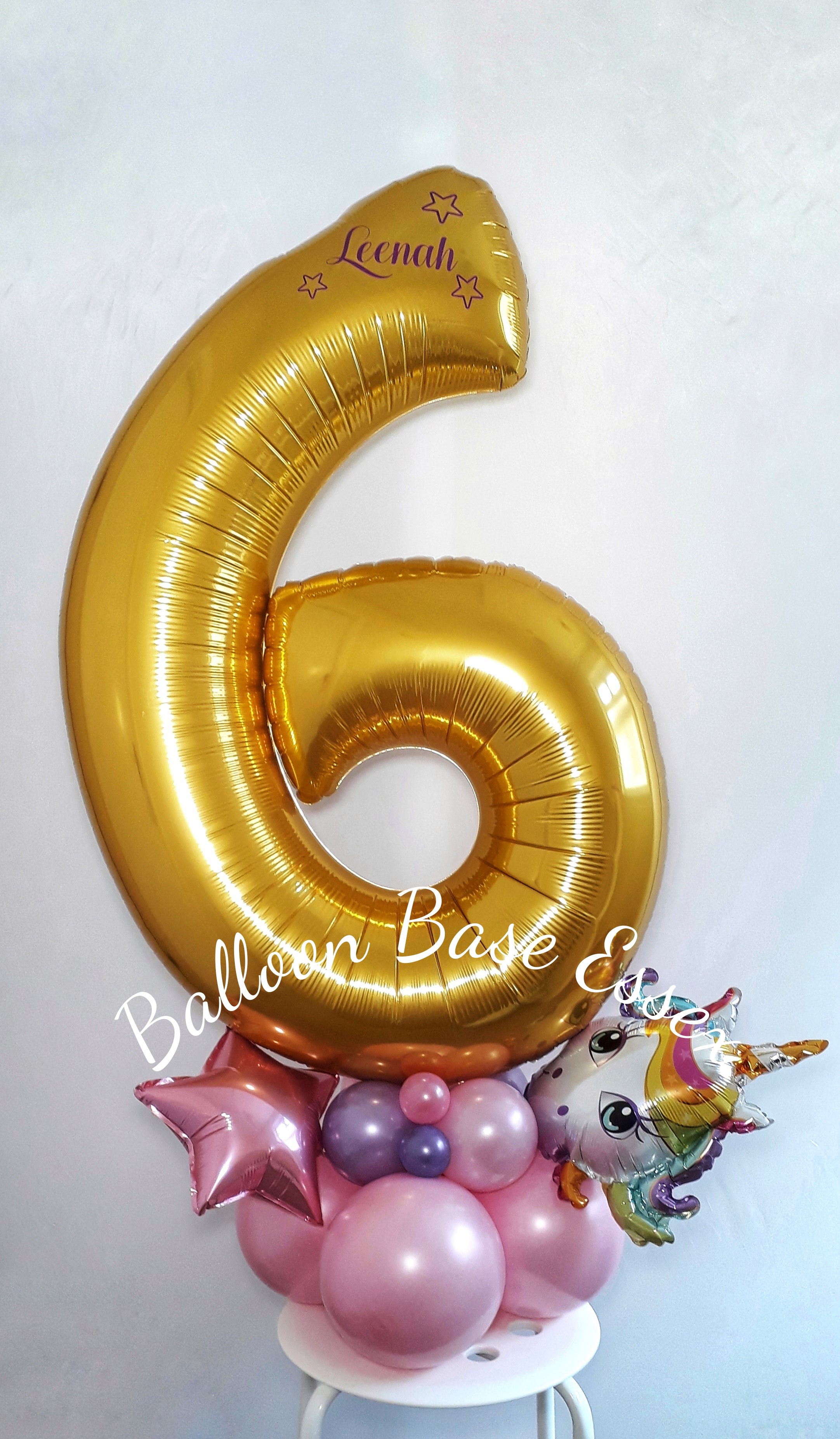 Gold number 6 balloon for a girl's birthday