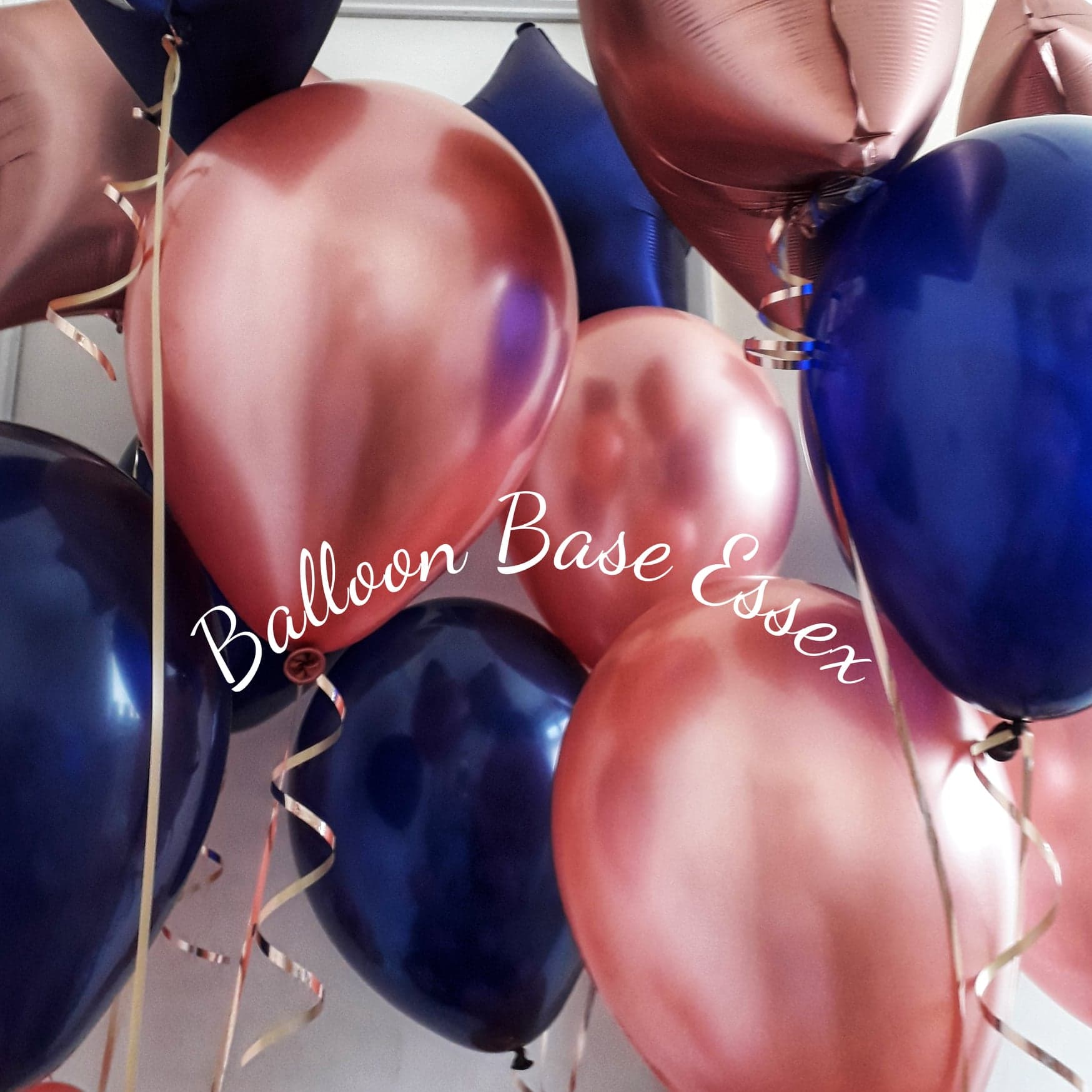 Rose gold and navy blue balloon bouquets