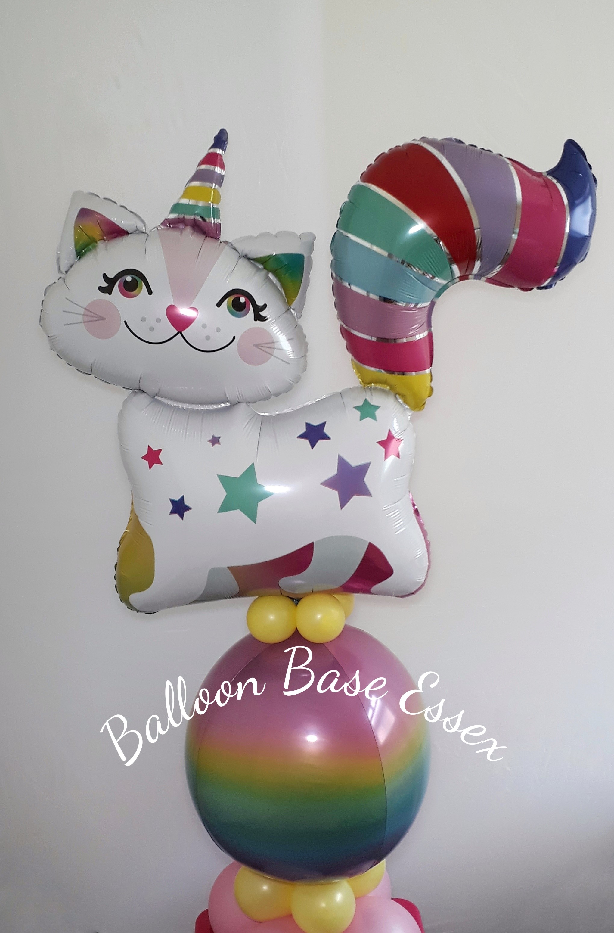 Rainbow caticorn theme balloon for child's birthday