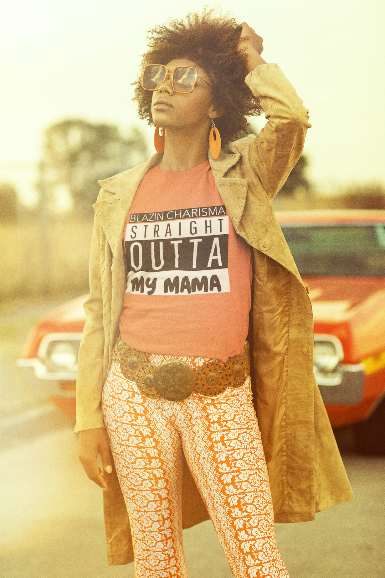 51-t-shirt-mockup-of-a-curly-hair-woman-posing-near-a-vintage-car-m10512.png