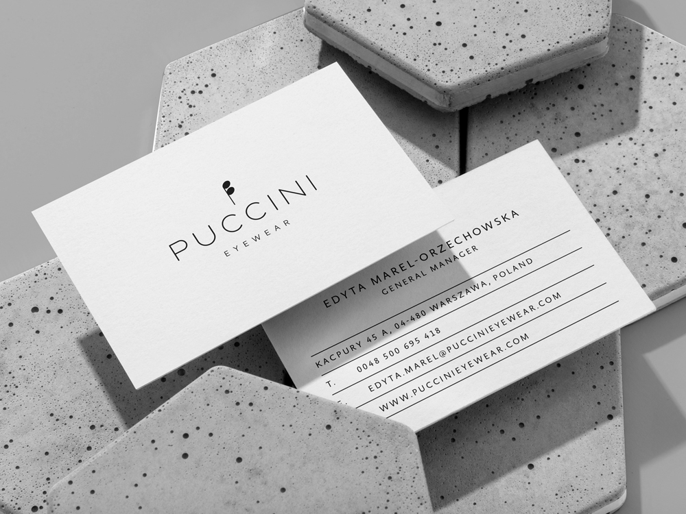 brand and visual identity design for eyewear company Puccini including elegant business card design 
