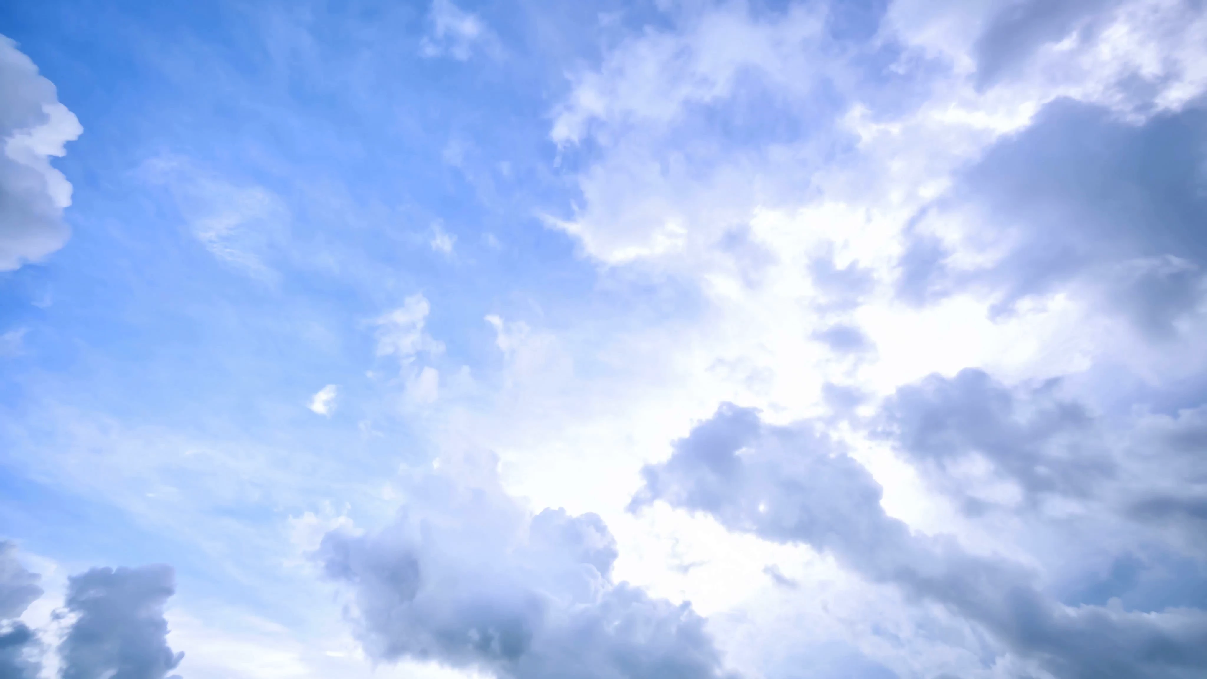 r1-4k-timelapse-dramatic-clouds-running-over-blue-sky-tropical-paradise-bali-indone.png