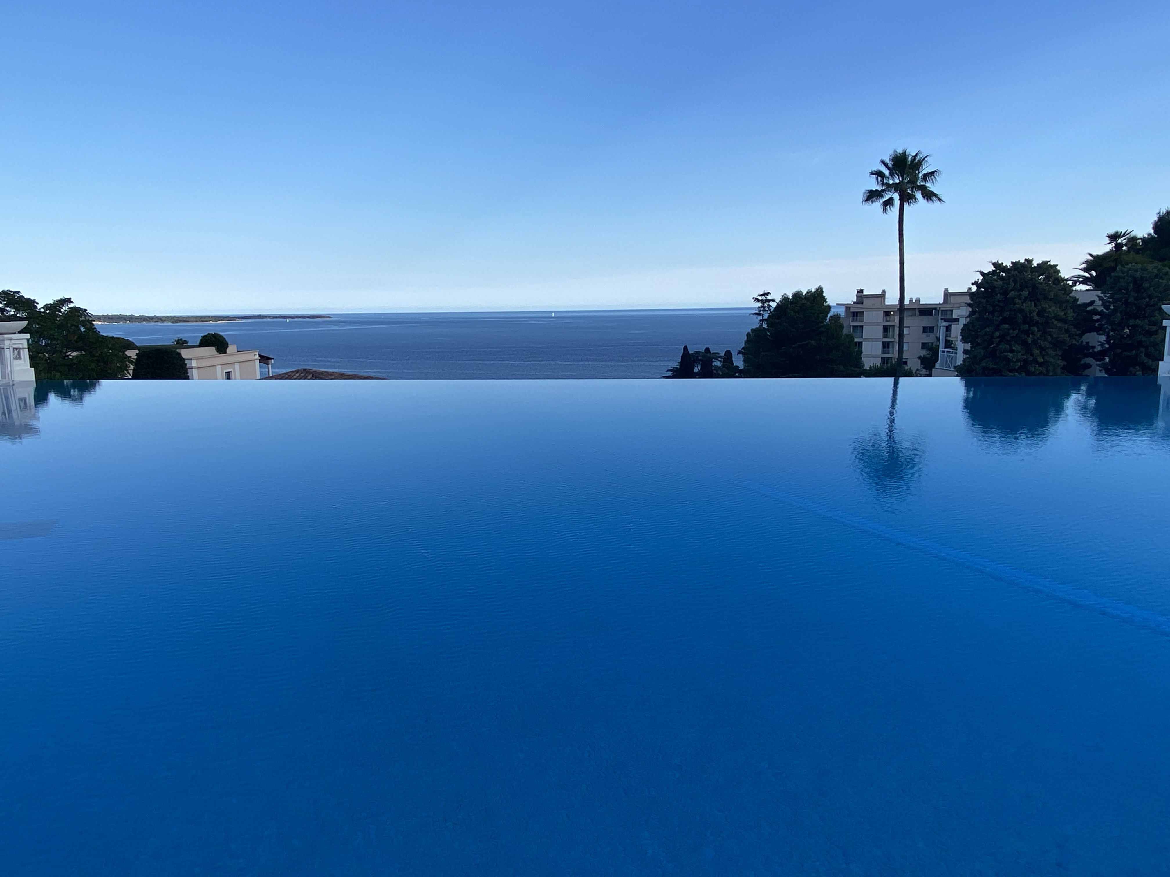 Infinity pool with view of the sea and islands