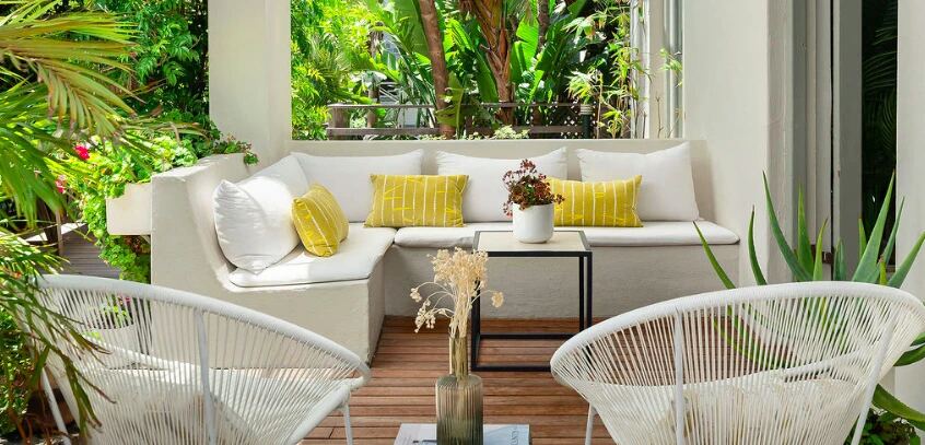 Garden terrace seating at Cape Town coliving accommodation