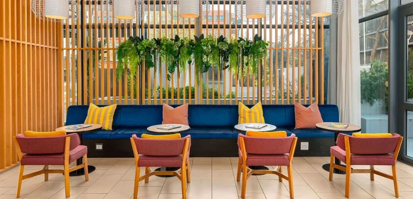 Colourful shared lounge in Cape Town coliving accommodation