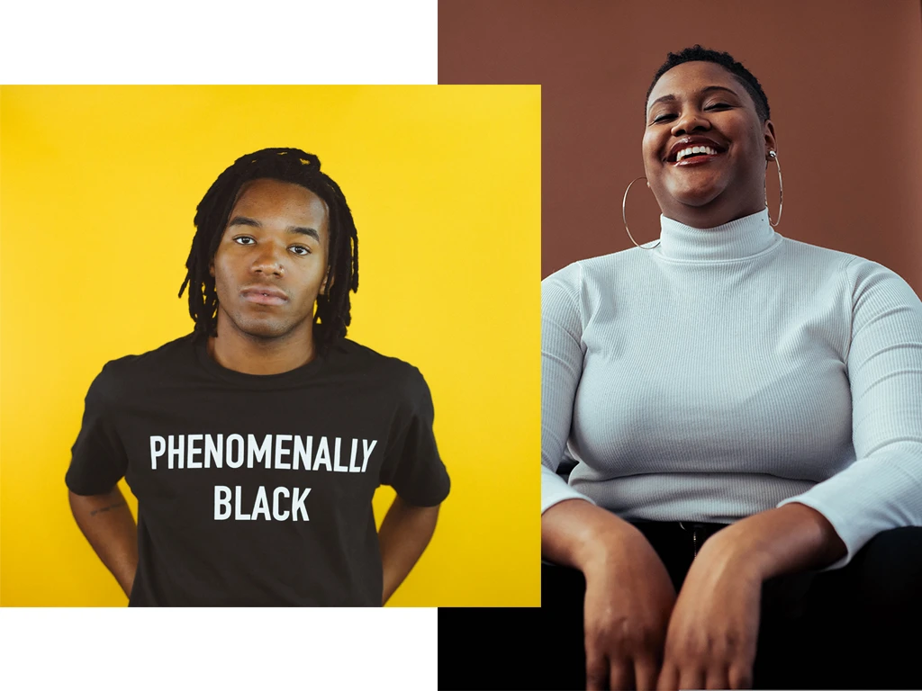 Young Black male wearing a t-shirt that read 'Phenomenally Black' and a picture of a Black woman with a short afro and a big smile