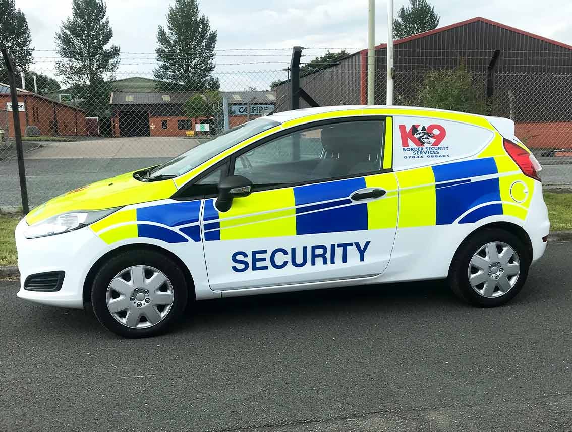 1280113485748-k9-security-vehicle-ford-fiesta-part-wrap-with-battenburg-reflective-side.jpg