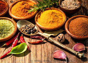 287-43659810-various-herbs-and-spices-on-wooden-table-15439473630981.jpg