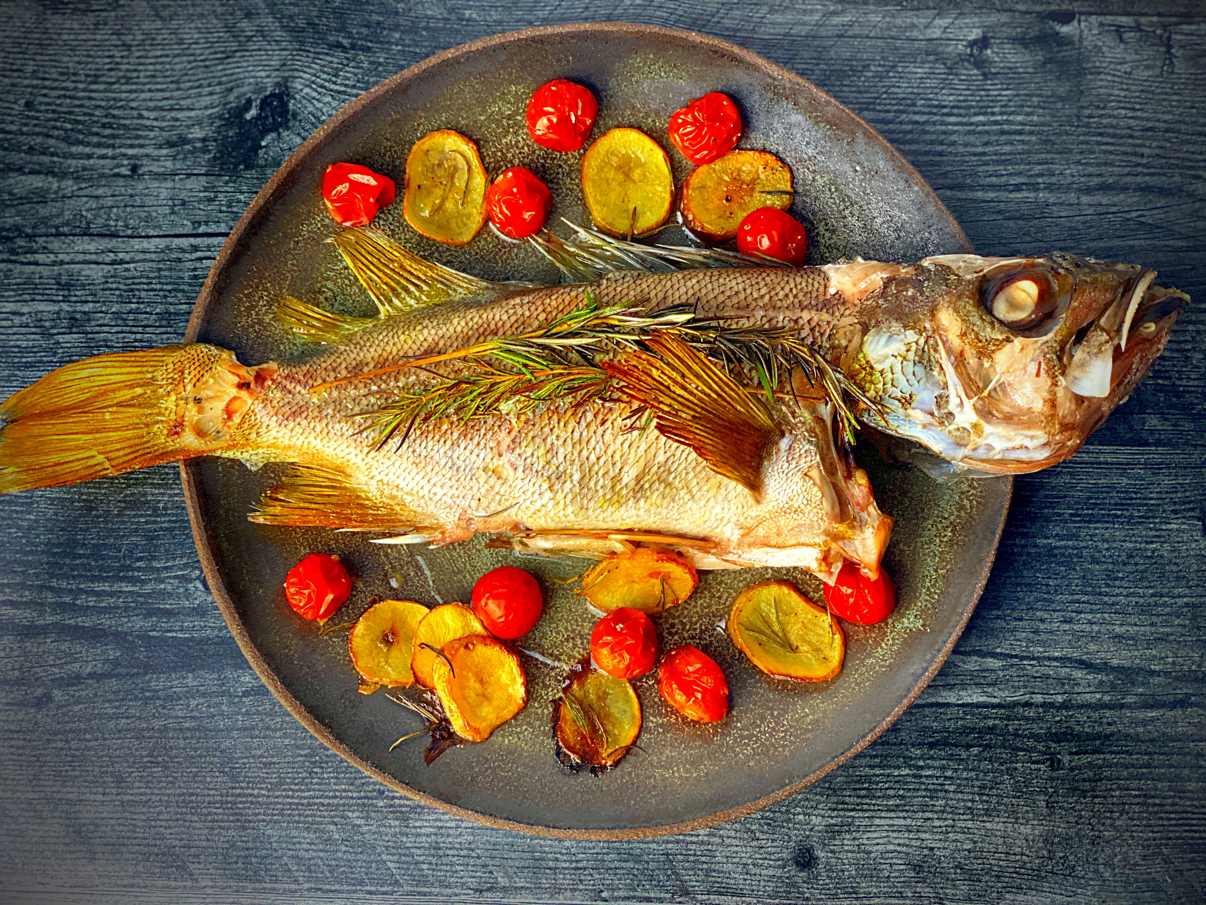 Oven Baked Yellowtail Rockfish with Crispy Potatoes and Cherry Tomatoes