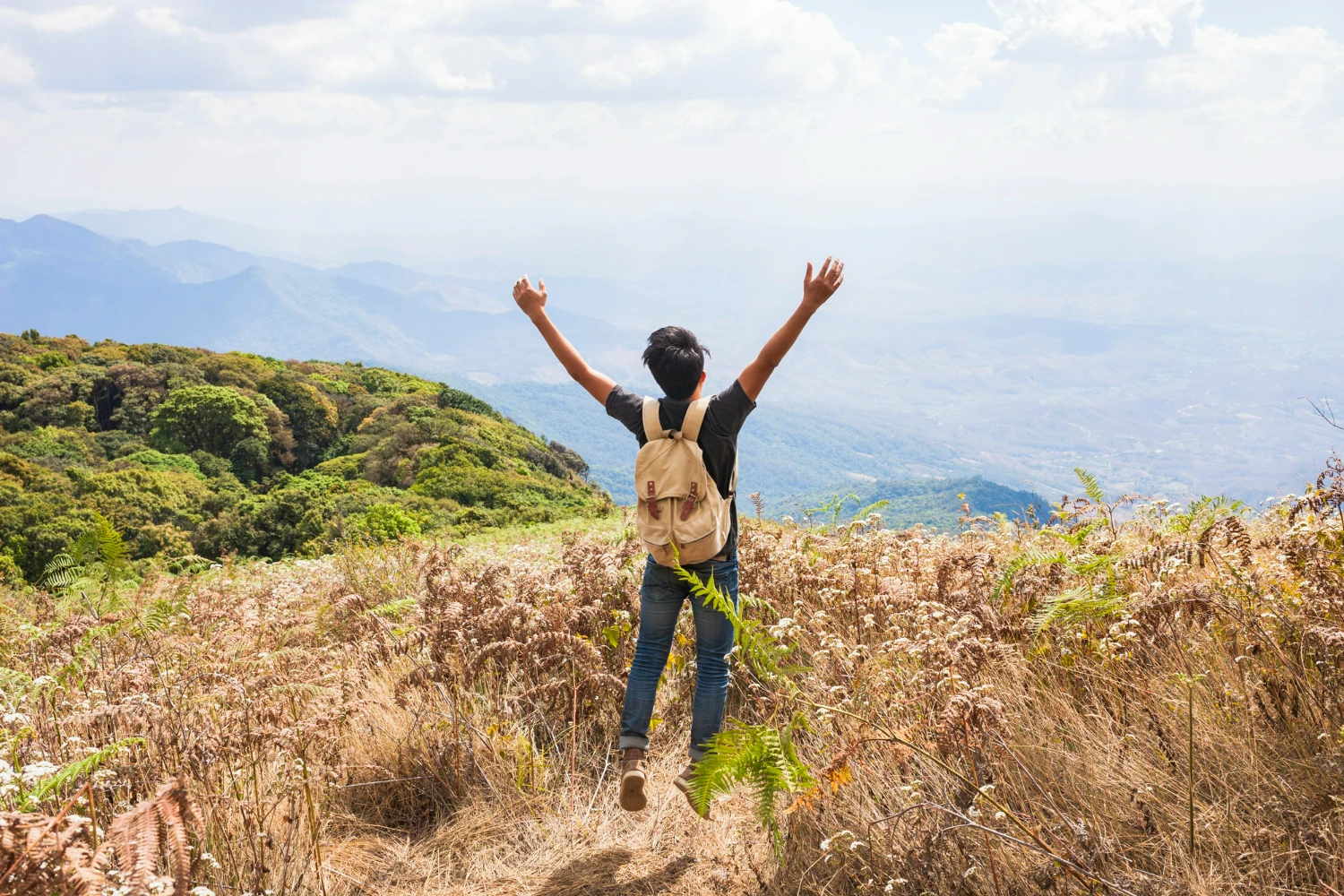 70-hiker-raising-arms-towards-sky-17078368451335.jpg