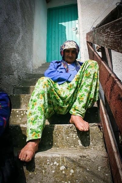 portrait of a Bulgarian grandmother on the stairs