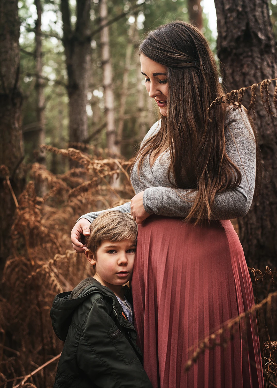 Mum and son taking a moment in nature during a family photography session