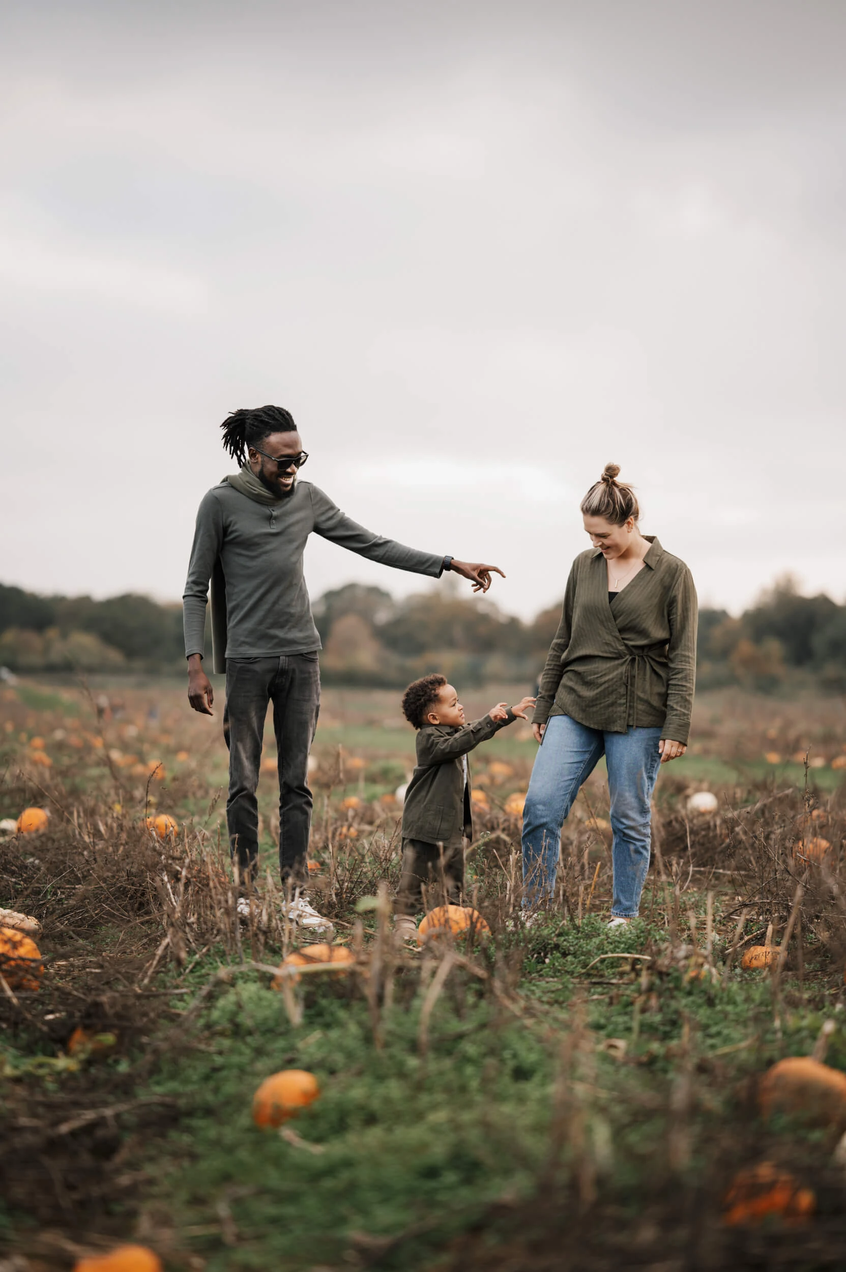 Laughing family during photography session outdoors