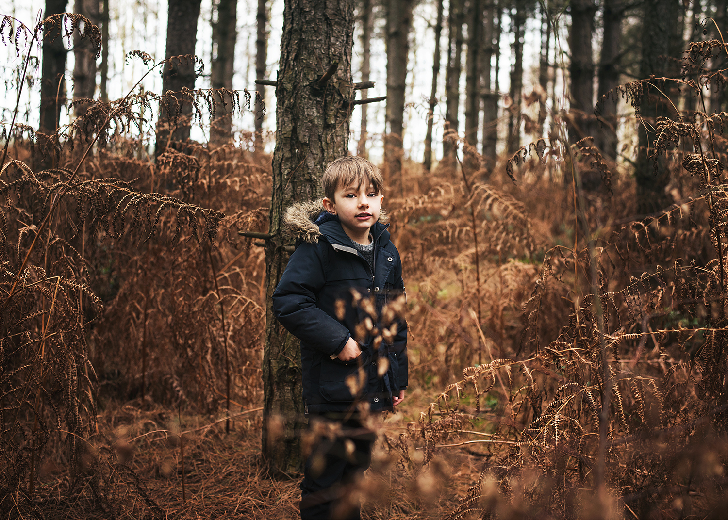 Candid photo of son playing during family shoot