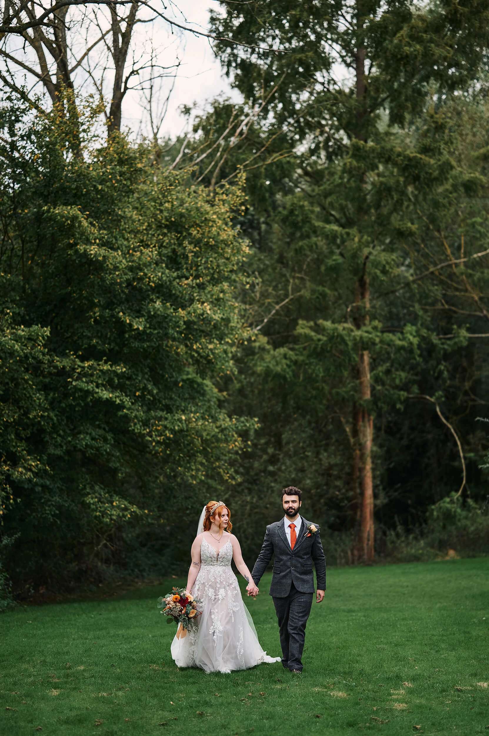 Relaxed couple portraits at The White Hart in Great Yeldham, Essex, surrounded by countryside