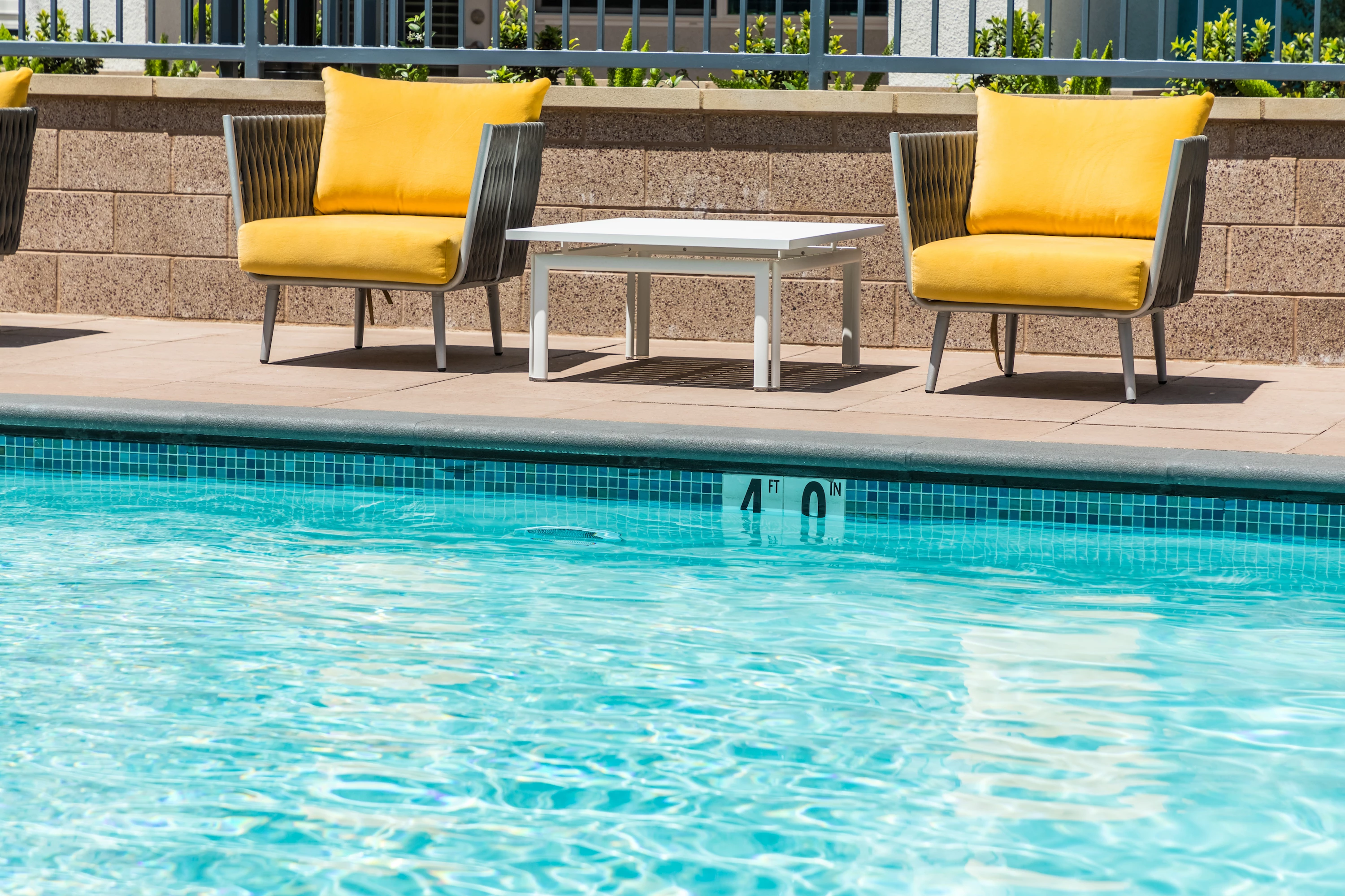 1251-16-pool-chairs-vignette-close-up-at-vela-on-ox-apartments-in-woodland-hills-ca.jpg
