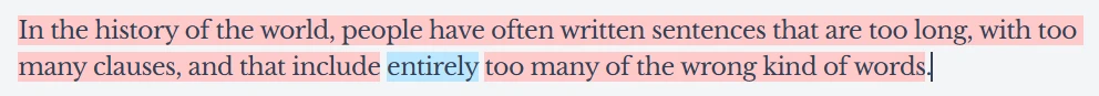 A sentence marked up in red and blue by Heminway Editor. The sentence reads: "In the history of the world, people have often written sentences that are too long, with too many clauses, and that include entirely too many of the wrong kind of words."