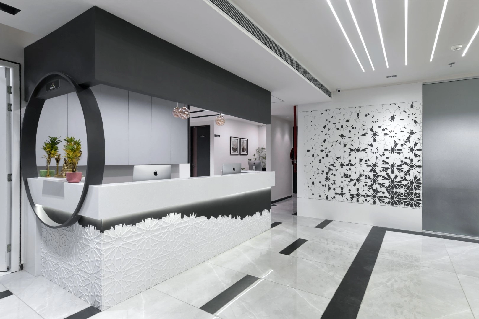 Spacious and well-designed reception in an ophthalmology center.- Pomegranate Designs Baroda