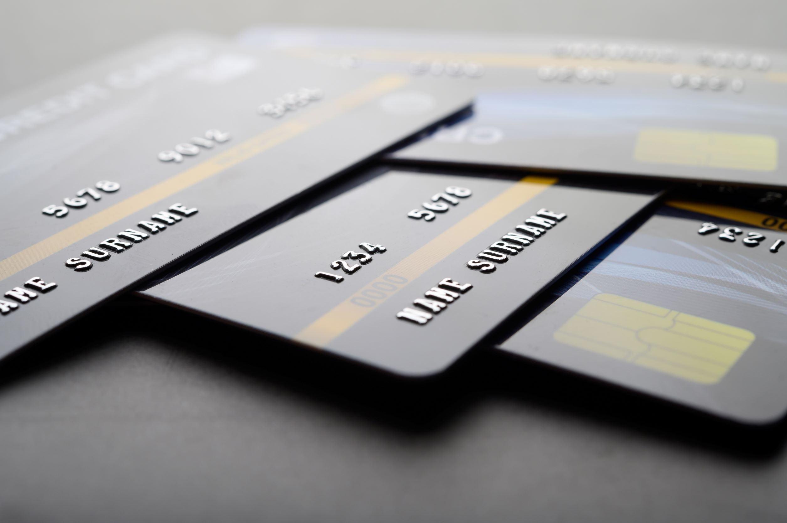 894-r336-credit-cards-that-are-stacked-floor.jpg