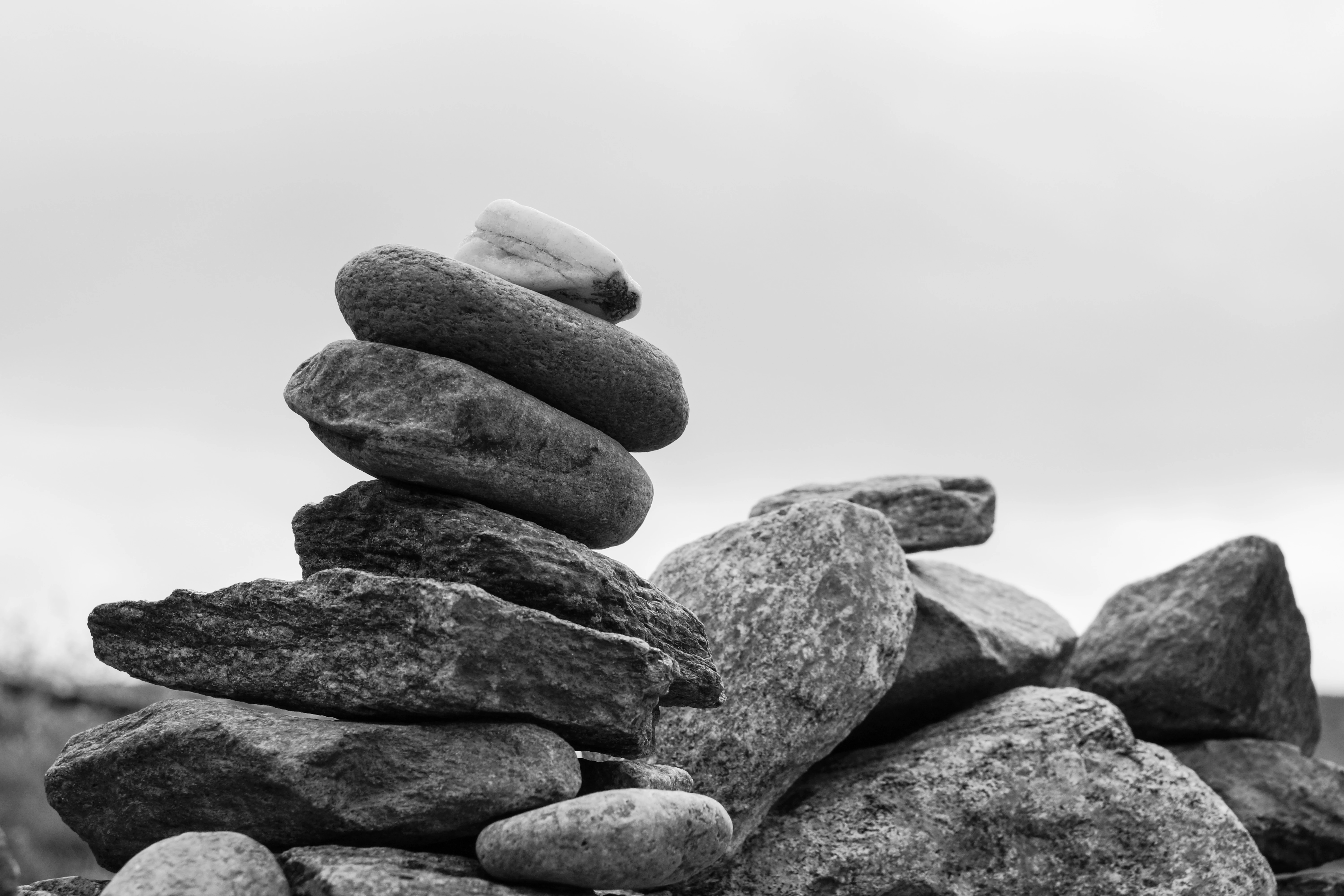 r100-rock-black-and-white-tower-balance-pebble-soil-1102859-pxherecom-16926032736262.jpg