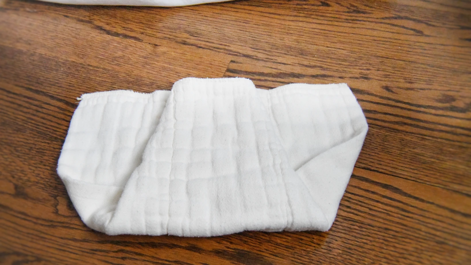 How to Fold a Prefold Cloth Diaper Step Two