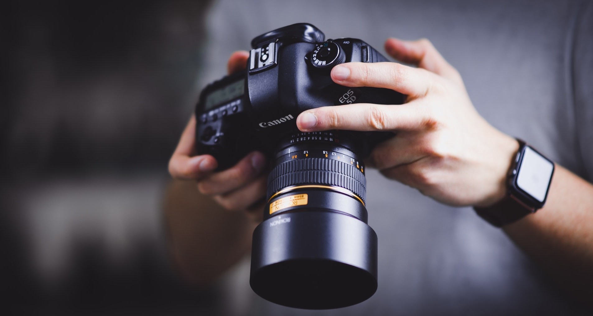 Photographer Holding a Camera